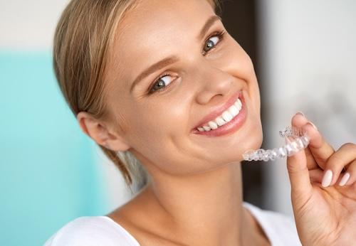 invisalign medina | woman with aligners