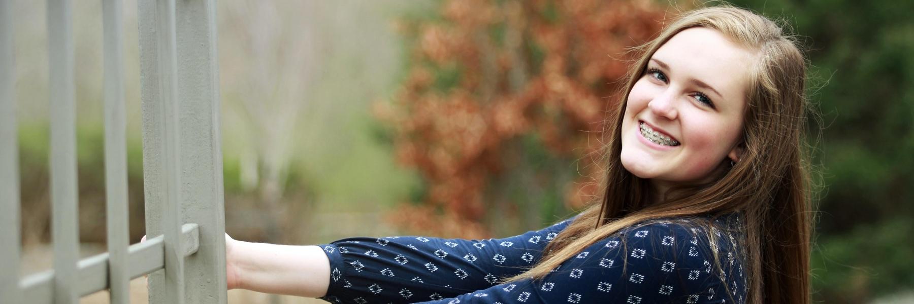 Girl wearing metal braces