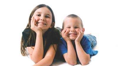 Family dentist Medina | Two children smiling 