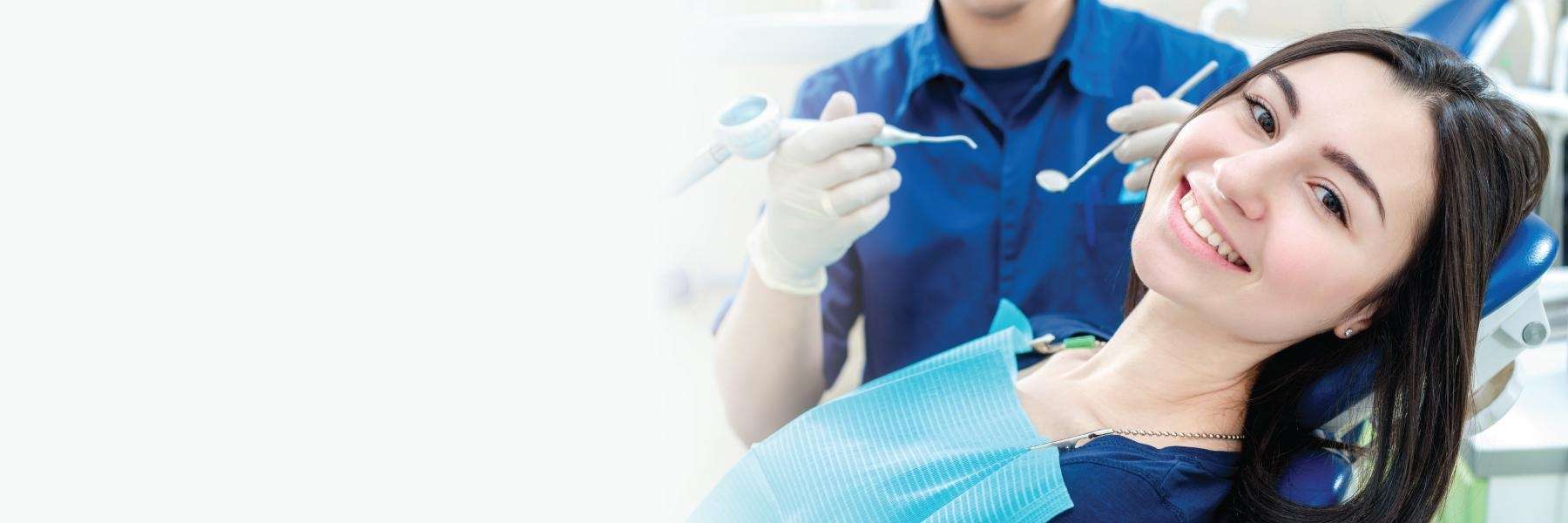 A woman receiving a dental exam