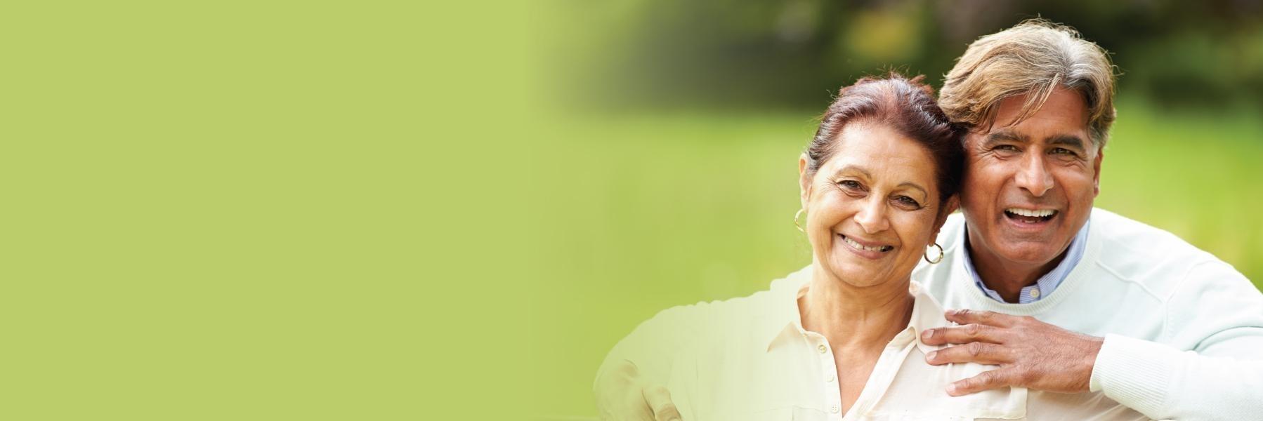 Patients smiling with their partial dentures in Medina, OH